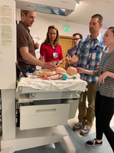 Residents learning about babies